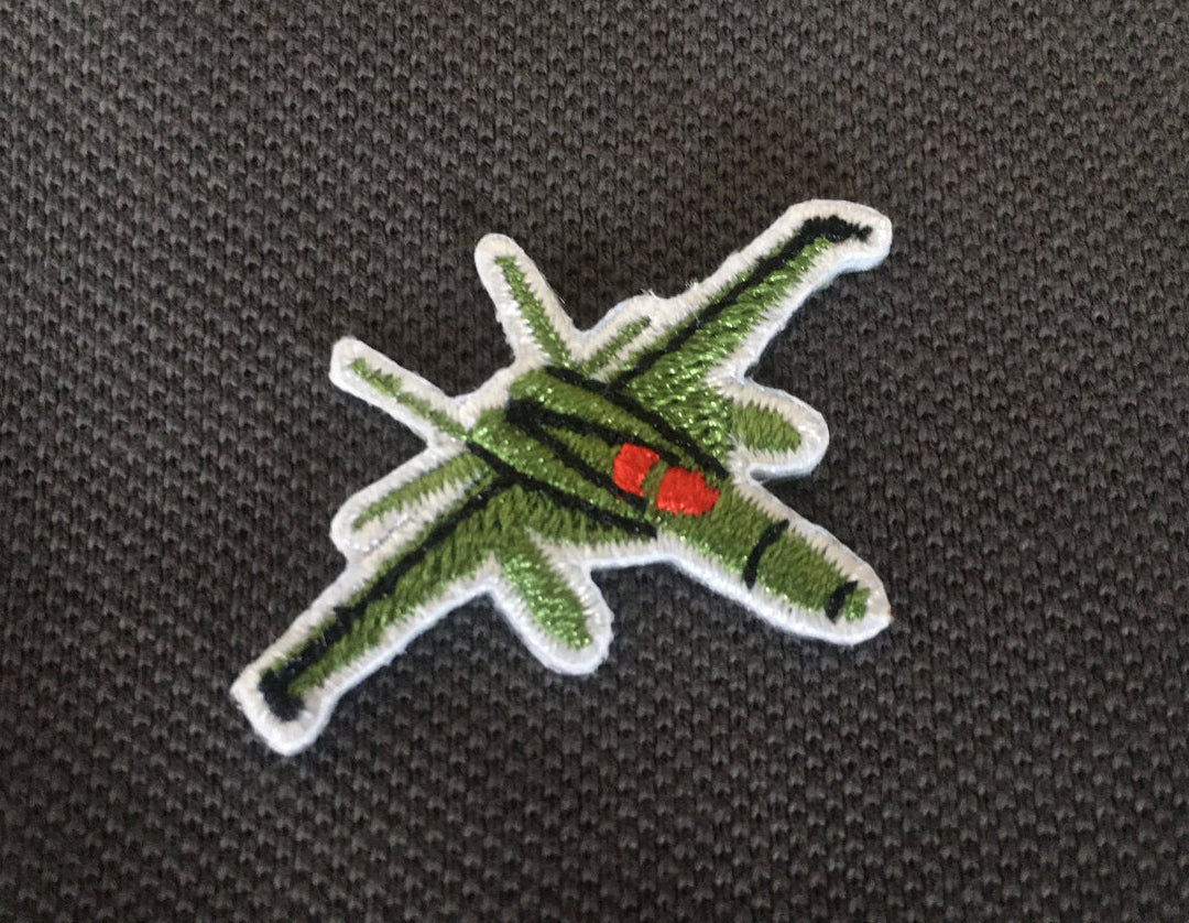 Mask with embroidered F/A-18 Hornet emblem